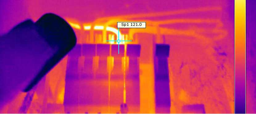 Thermal camera image showing moisture behind a wall during an infrared inspection