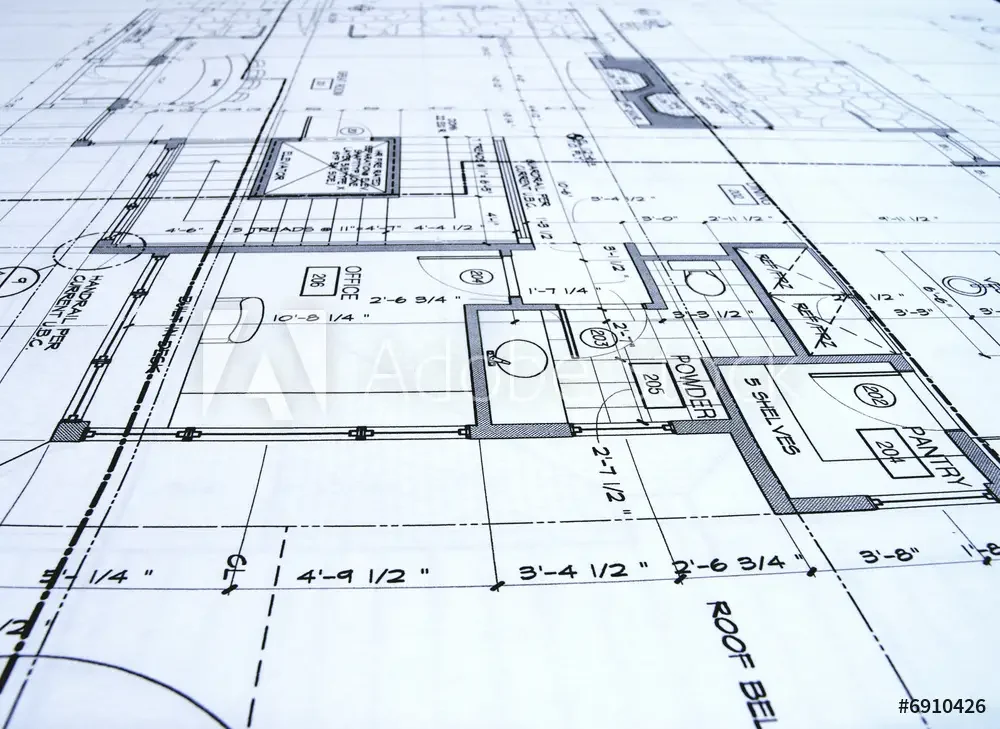 Architectural blueprints on a desk
