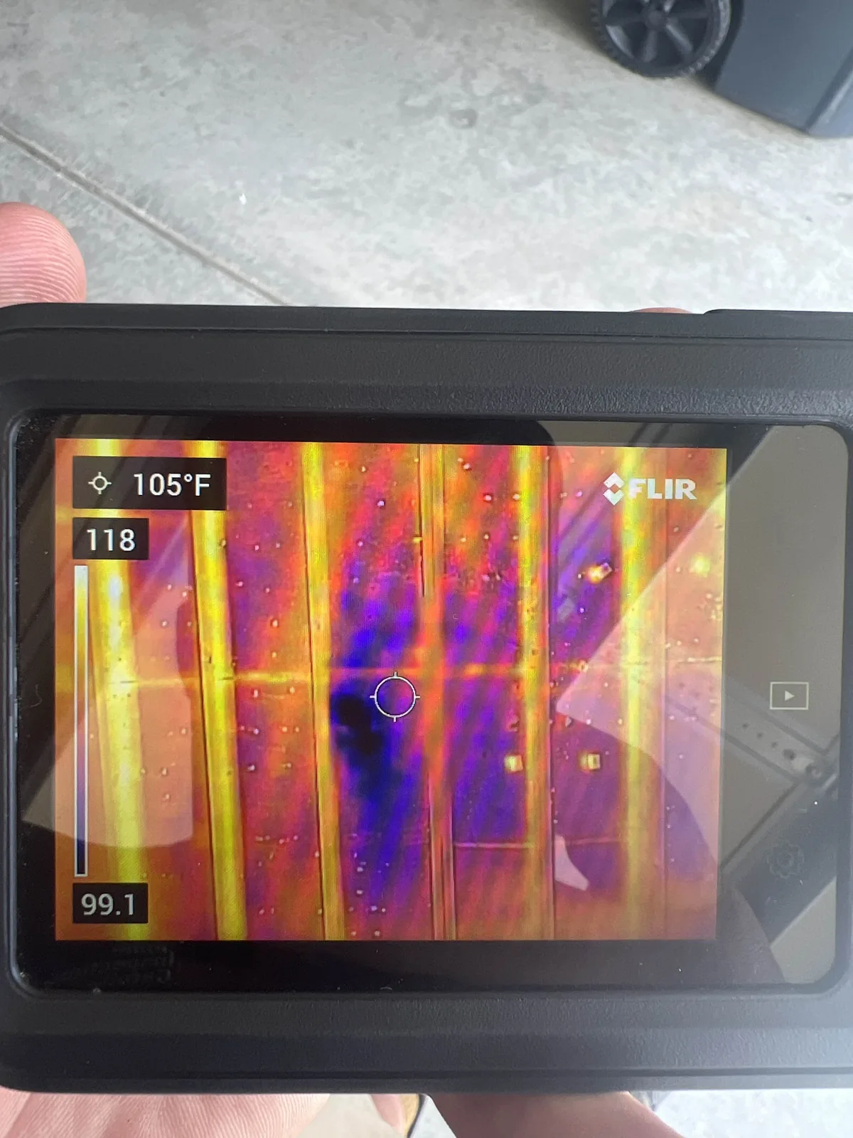 Thermal imaging camera showing hidden moisture inside a wall